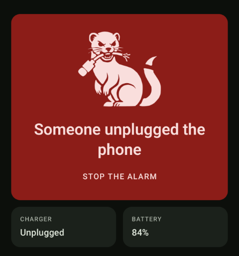 Pubby's alarm screen: Someone unplugged the phone, with a button to stop the alarm.